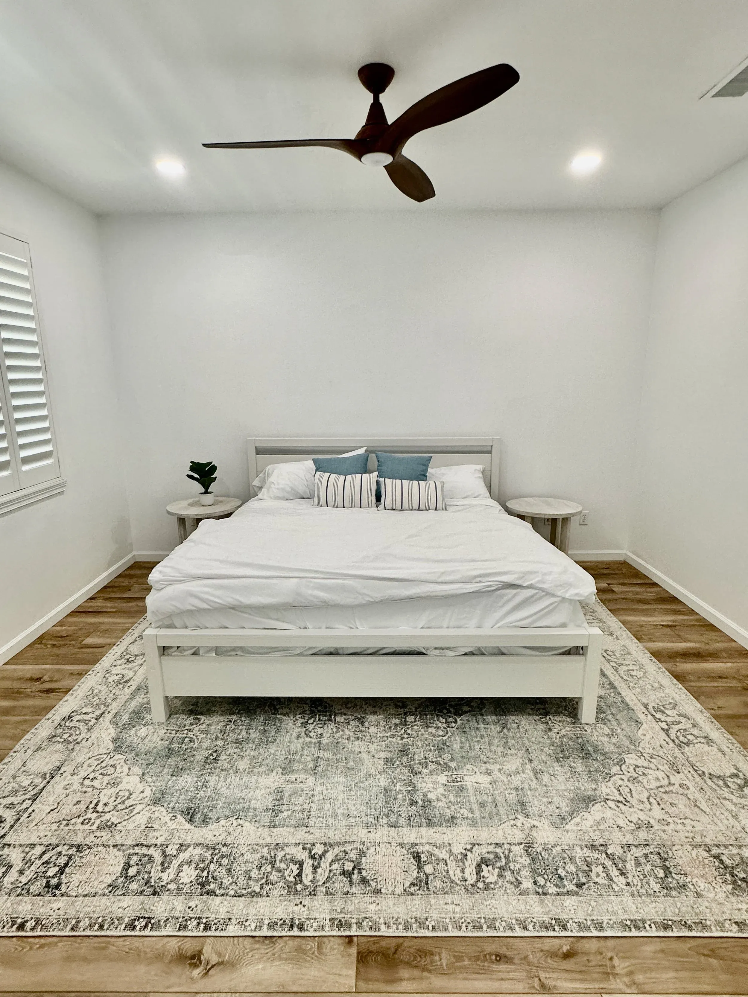 Bedroom with king bed and ceiling fan
